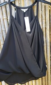 Black flowy drape tank.  Staple piece.